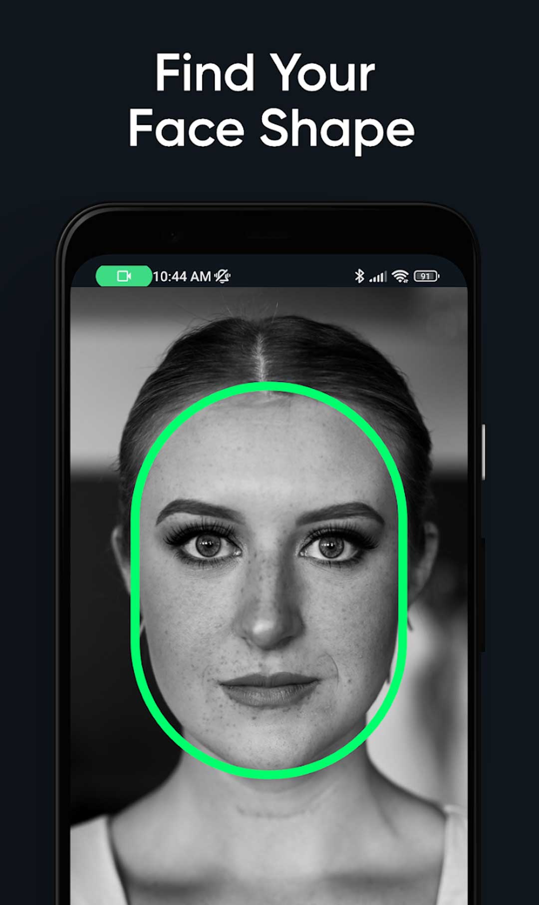 A woman using the Hiface app on her phone to determine her face shape.