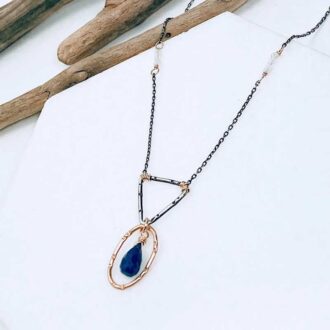 Mixed metal necklace with lapis lazuli teardrop pendant and moonstone details