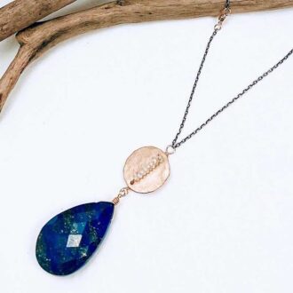 Bold lapis lazuli drop pendant necklace with hammered gold disc and moonstone accents