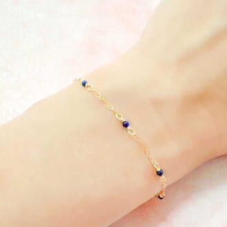 Dainty bracelet with floating lapis lazuli gemstone beads on 14k gold-filled chain