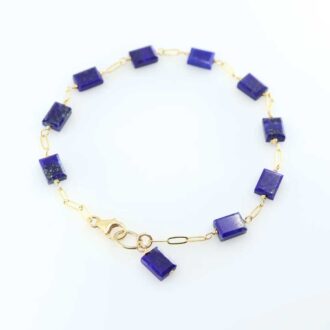Handcrafted bracelet featuring rectangular lapis lazuli stones on a 14k gold-filled paperclip chain