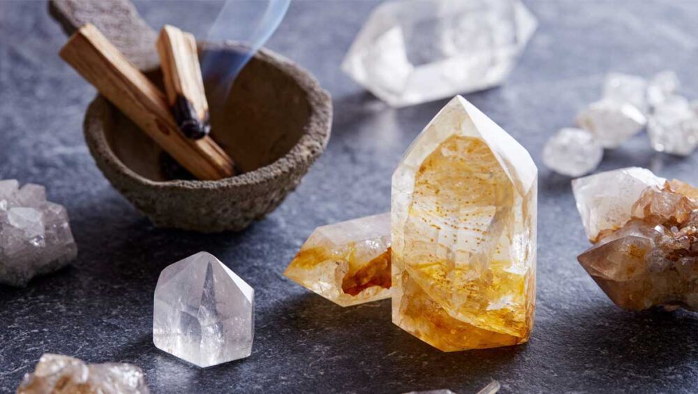 Citrine healing crystal with palo santo and smoke for energy cleansing