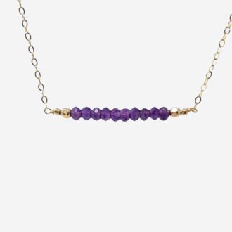 14k gold-filled chain with a horizontal bar of faceted purple amethyst beads