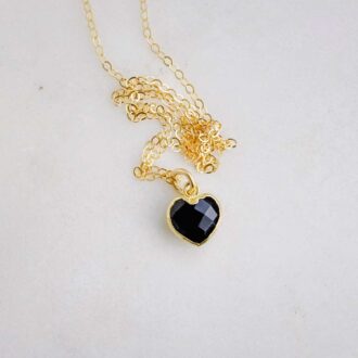 Black Onyx Heart Necklace with 14k gold-filled chain and gold electroplated setting.