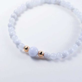 Blue lace agate horizon bracelet with soft blue beads and accent details.
