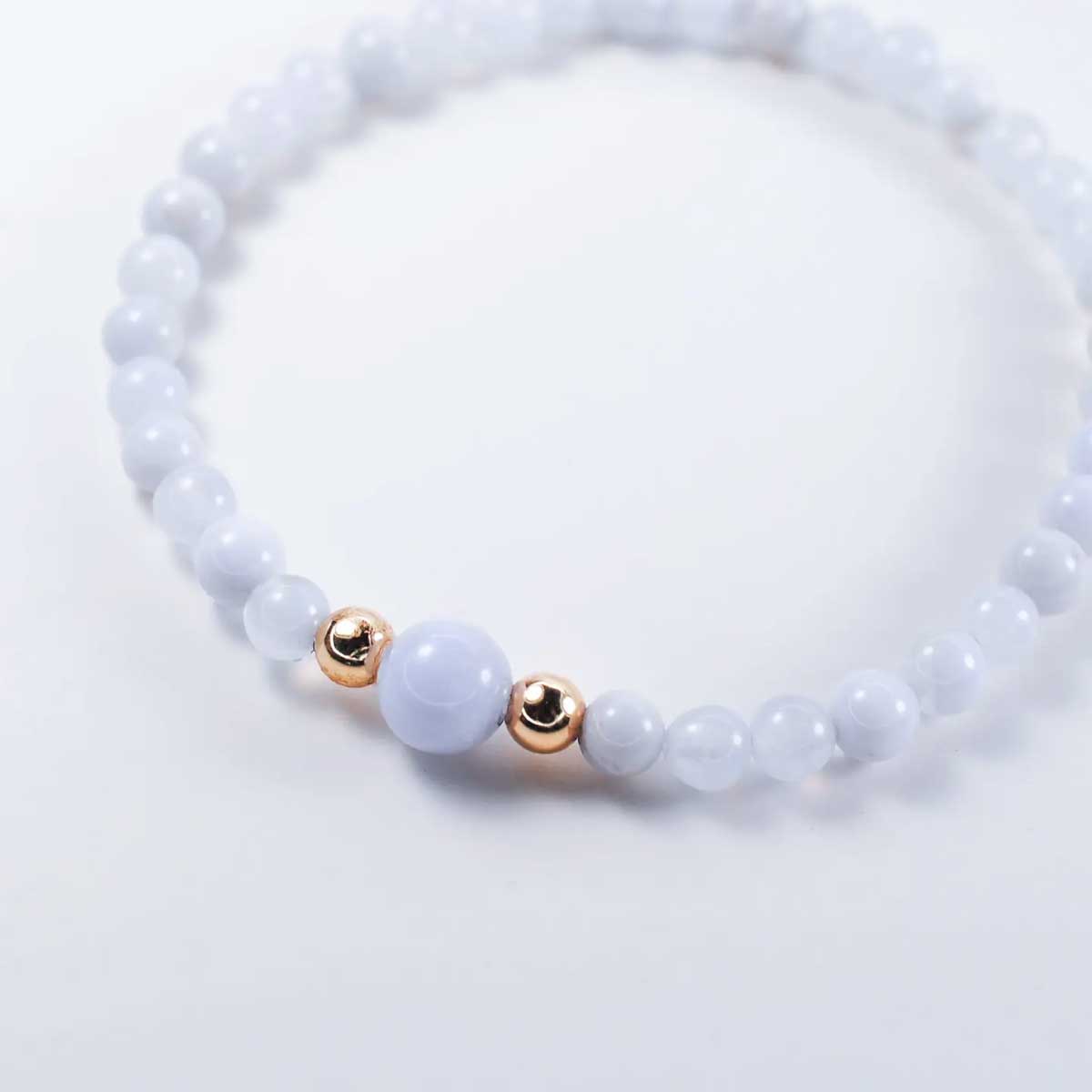 Blue lace agate horizon bracelet with soft blue beads and accent details.