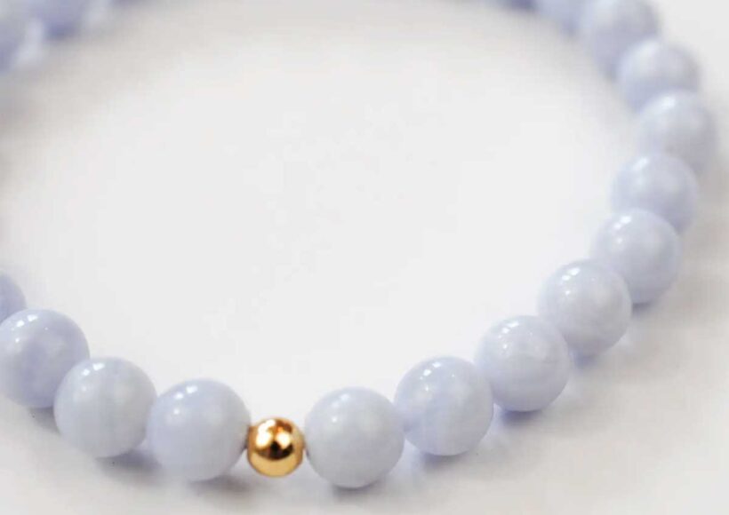 Blue lace agate bracelet with soothing pale blue beads and a single accent bead.
