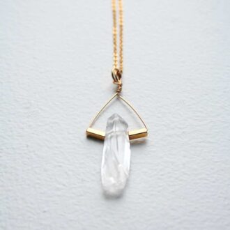 Clear quartz boho pendant necklace with raw crystal point and gold-filled chain