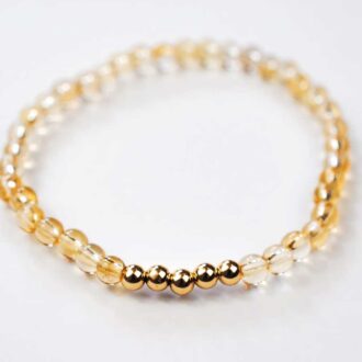 Citrine beaded stretch bracelet with five gold-filled accent beads