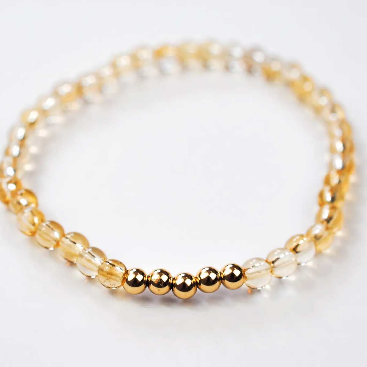 Citrine beaded stretch bracelet with five gold-filled accent beads
