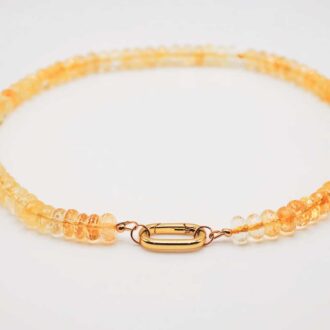 16-inch citrine choker of hand-cut rondelle beads with a paperclip clasp and an off-center gold-filled accent bead