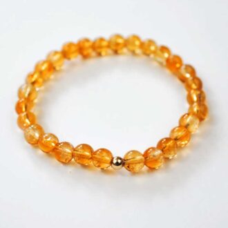6mm citrine beaded stretch bracelet with a single gold-filled accent bead