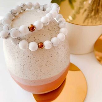 White howlite beaded bracelet with bronze center bead, for peace and calming energy.