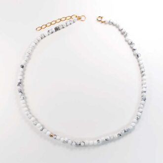 White howlite solo mini choker with small 4mm stones and a single gold-filled accent bead on an adjustable chain.