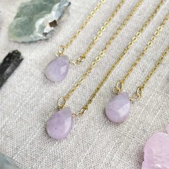 Lepidolite faceted teardrop necklace with gold chain, soothing lavender gemstone for calming practices.