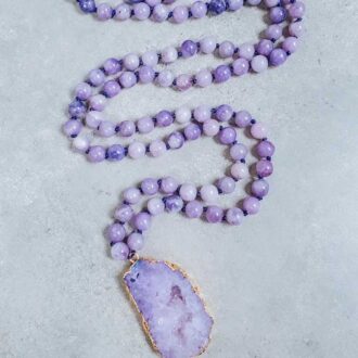 Lepidolite mala necklace with 108 lavender gemstone beads and raw lepidolite pendant, designed for meditation and spiritual purification.