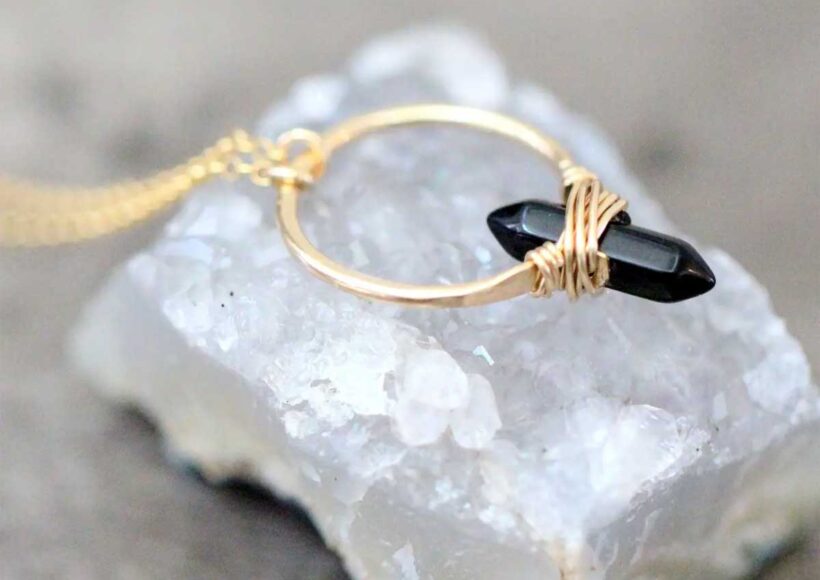 Obsidian Crest Necklace with gold hoop and double pointed black crystal