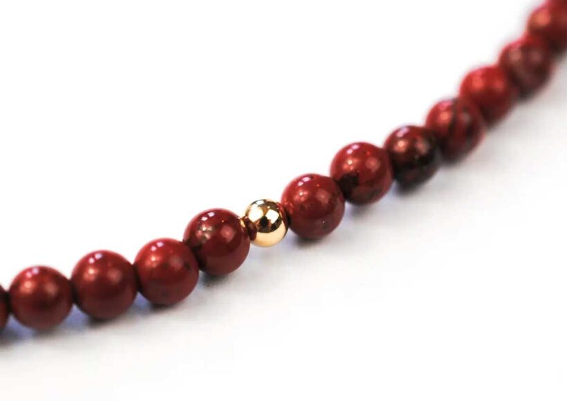 Red Jasper Solo Mini Choker with gold accent bead on a delicate chain.