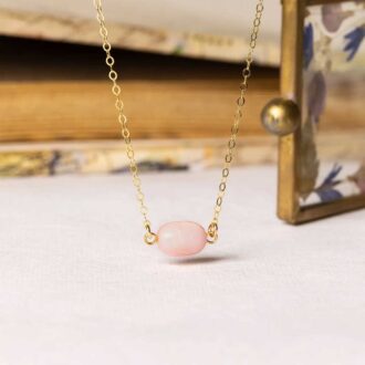 Rose quartz stadium shape gemstone pendant on a delicate 14k gold filled chain.