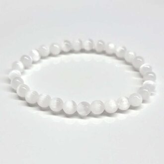 Selenite beaded bracelet with 6mm polished round crystals.
