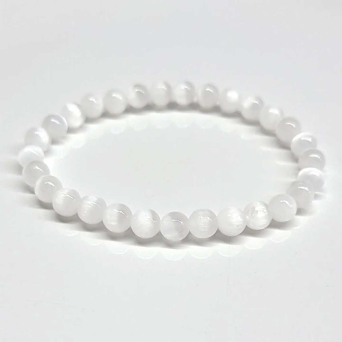 Selenite beaded bracelet with 6mm polished round crystals.