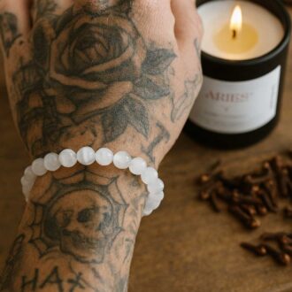 Selenite 8mm round beaded bracelet on wrist, designed for energy cleansing, clarity, and calm.
