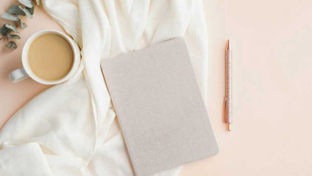 emotional self trust tracker journal and pen in a calm, reflective setting