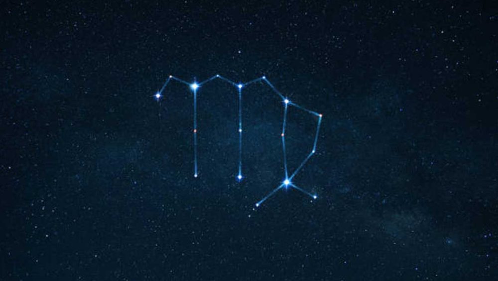 virgo constellation in a dark blue night sky with softly glowing stars