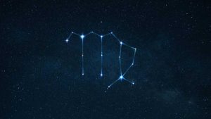 virgo constellation in a dark blue night sky with softly glowing stars