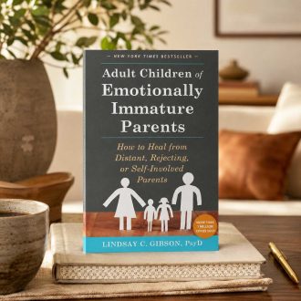 Adult Children of Emotionally Immature Parents book displayed on a wooden table in a warm living room setting with soft natural light.