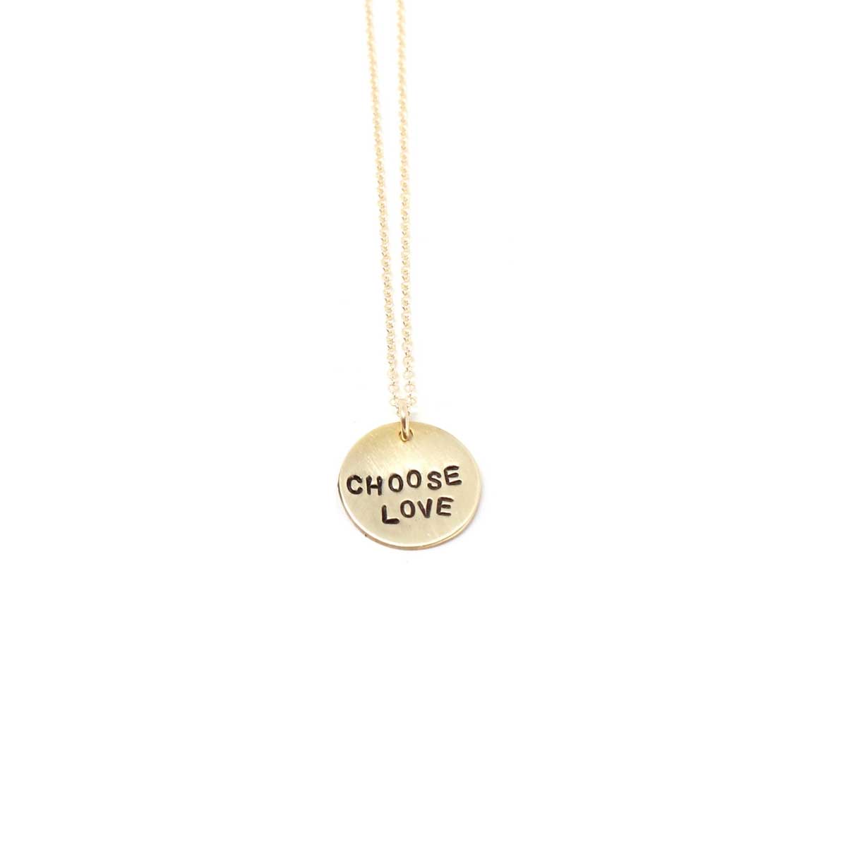 Gold Choose Love pendant necklace on a delicate gold-filled chain against a white background.